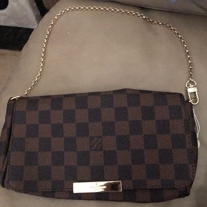 Louis Vuitton clutch with chain